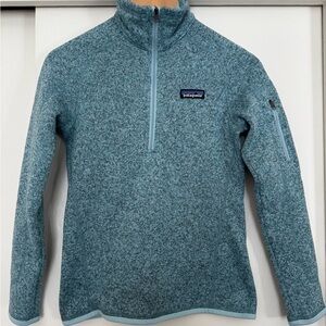 Patagonia UNISEX Blue Heather Zip-Up Sweater. Stylish zip pocket on left arm.